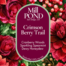Load image into Gallery viewer, “Candle label reading Crimson Berry Trail, featuring soft red and berry‑toned artwork with subtle winter greenery and gentle trail‑inspired accents.”

