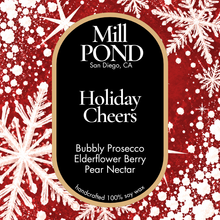 Load image into Gallery viewer, “Red holiday candle label reading Holiday Cheers, surrounded by white snowflakes and festive decorative elements.”
