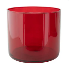Load image into Gallery viewer, A translucent red glass vase with a smooth, cylindrical shape, shown against a plain white background.
