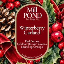 Load image into Gallery viewer, A decorative holiday label or packaging design for Mill Pond 'Winterberry Garland' wax melt or scented candle, featuring a central dark red oval with white text over a background filled with red berries, green garland leaves, pinecones, and a red ribbon.
